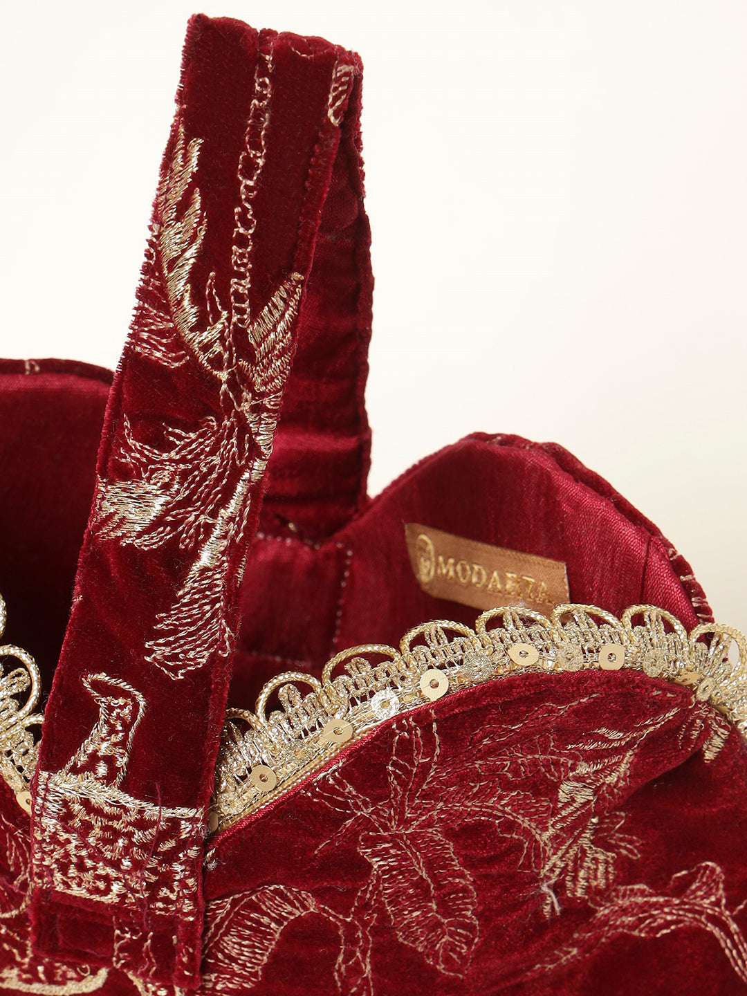 Red embroidered potli ideal for gifting and celebrations