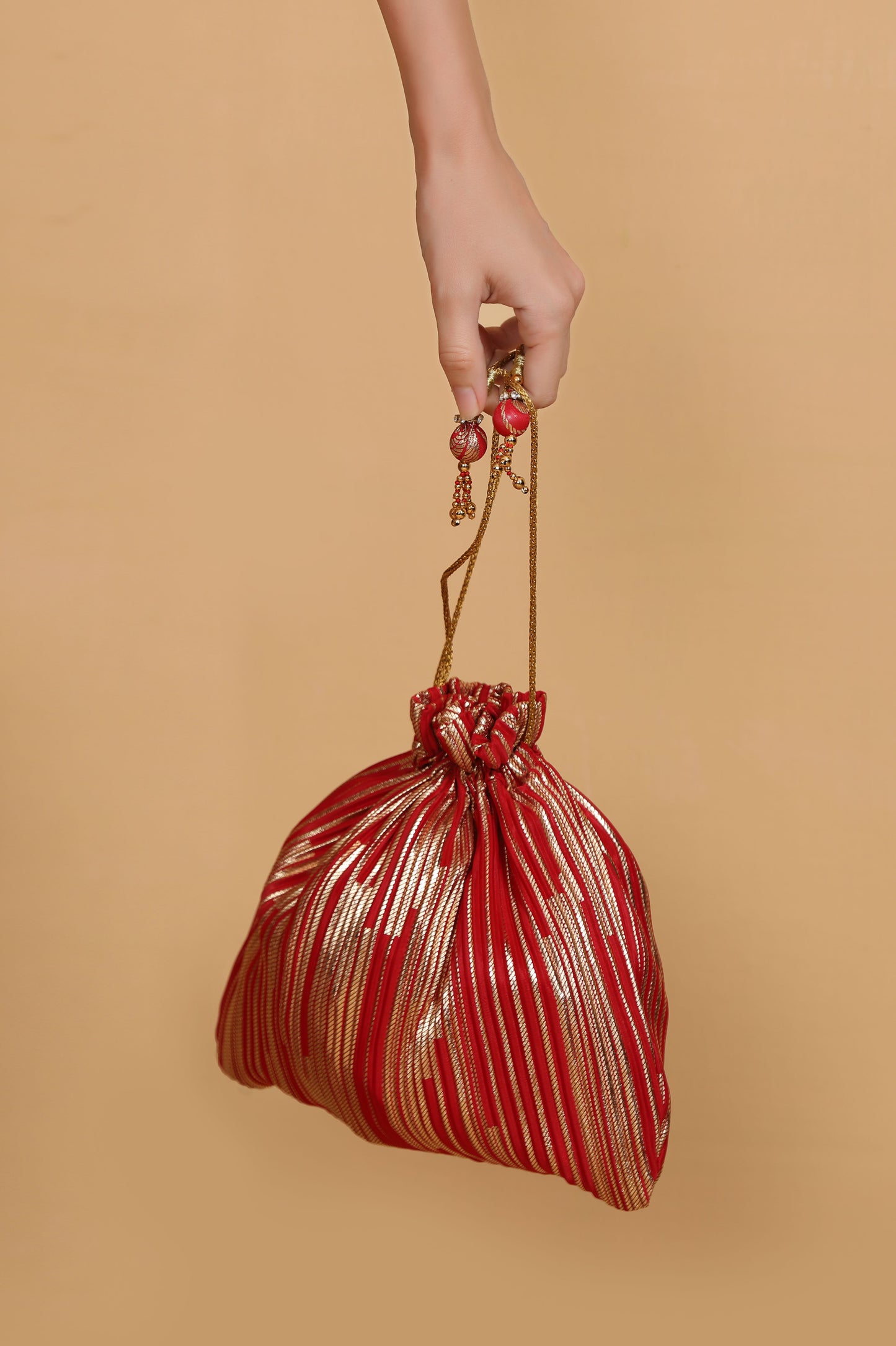 red bead work potli bag, sequin potli bag, long tassel potli, red ethnic bag, glorious tower red potli bag