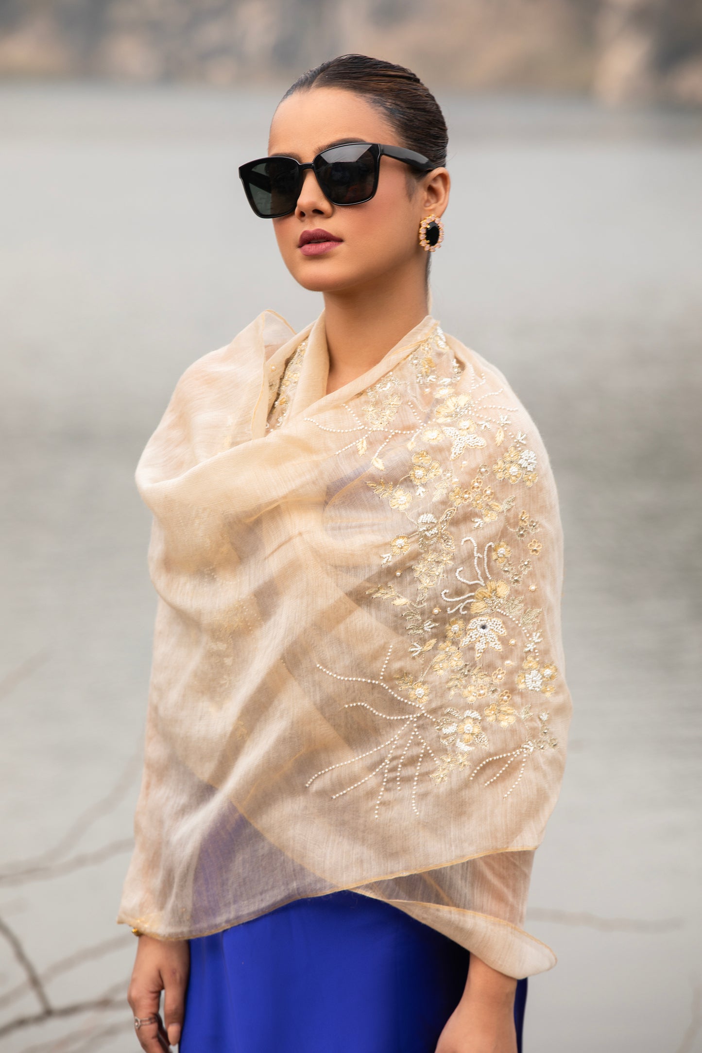 Wrap yourself in chic comfort with our exquisite Wool Scarf, the perfect accessory for sophisticated women seeking warmth and style. Crafted in timeless beige, our stole epitomizes elegance and luxury, making it a must-have for every fashionable lady's wardrobe.