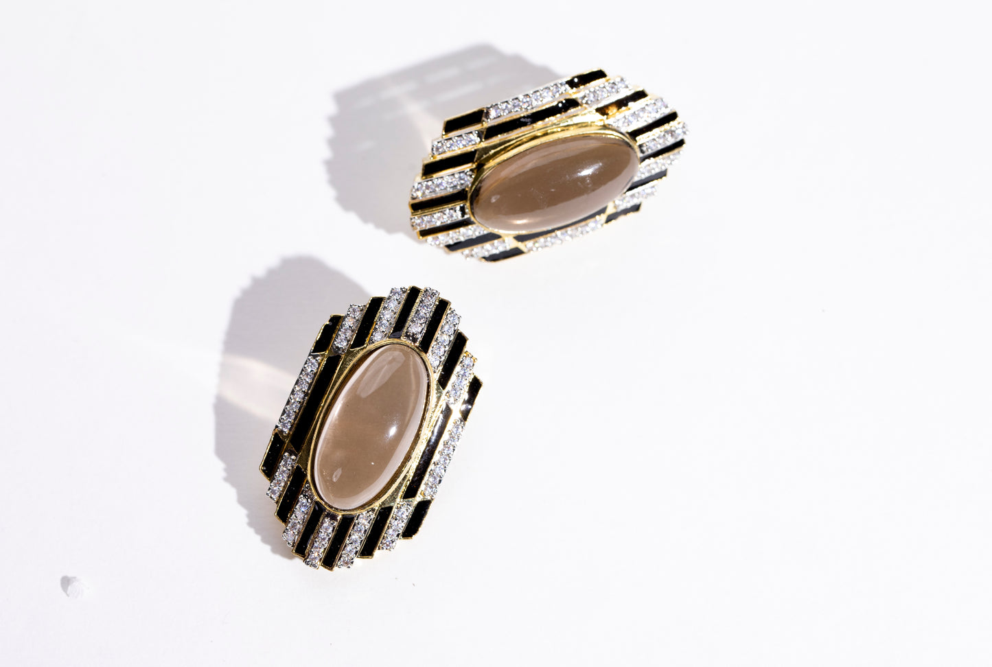 Fashionable Precious Stone Earrings: Stand out with these uber earrings adorned with black stone and other gems