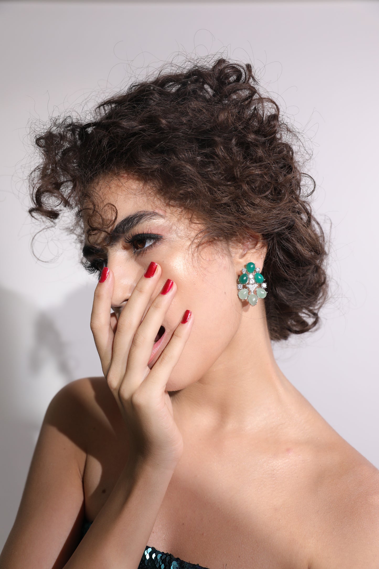 Stunning Dual Tone Green Emerald Earrings: Sparkling Swarovski accents add glamour to your look