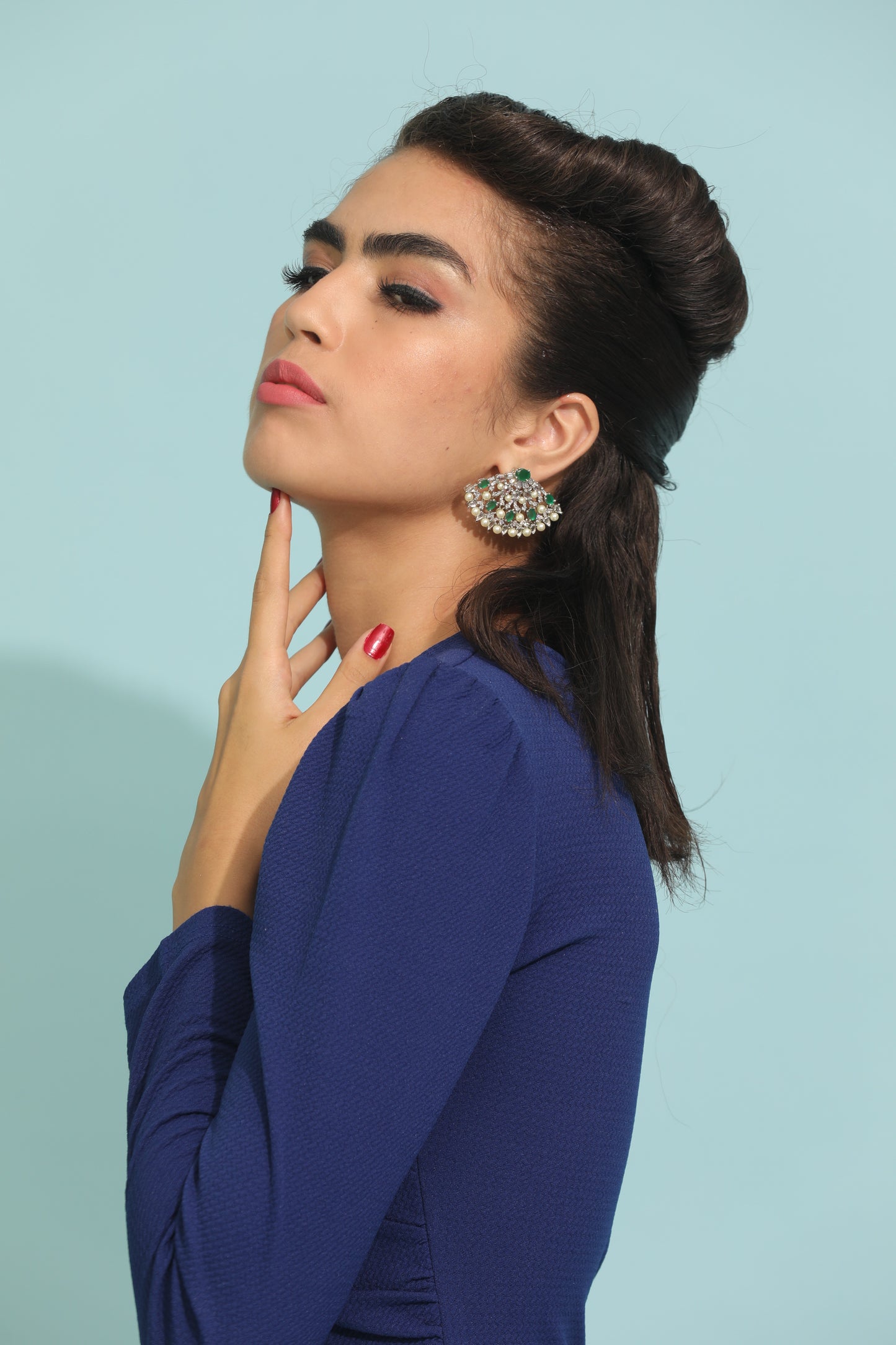 Swarovski Crystal Fan Earrings: Add sophistication to your style with these unique Japanese-inspired earrings." "Unique Exotic Earrings: Make a statement with these earrings featuring emerald, pearls, and Swarovski crystals