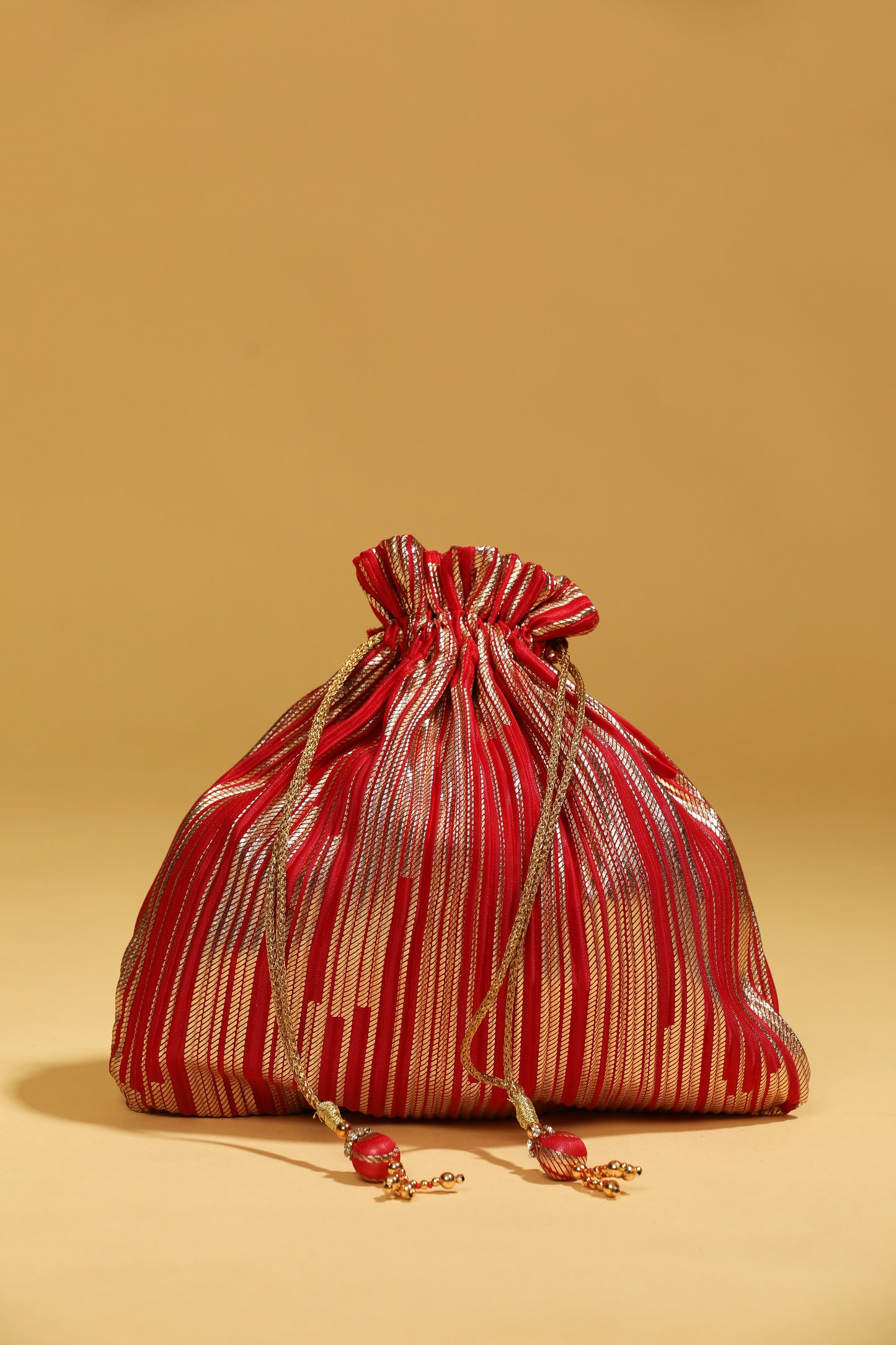 red bead work potli bag, sequin potli bag, long tassel potli, red ethnic bag, glorious tower red potli bag