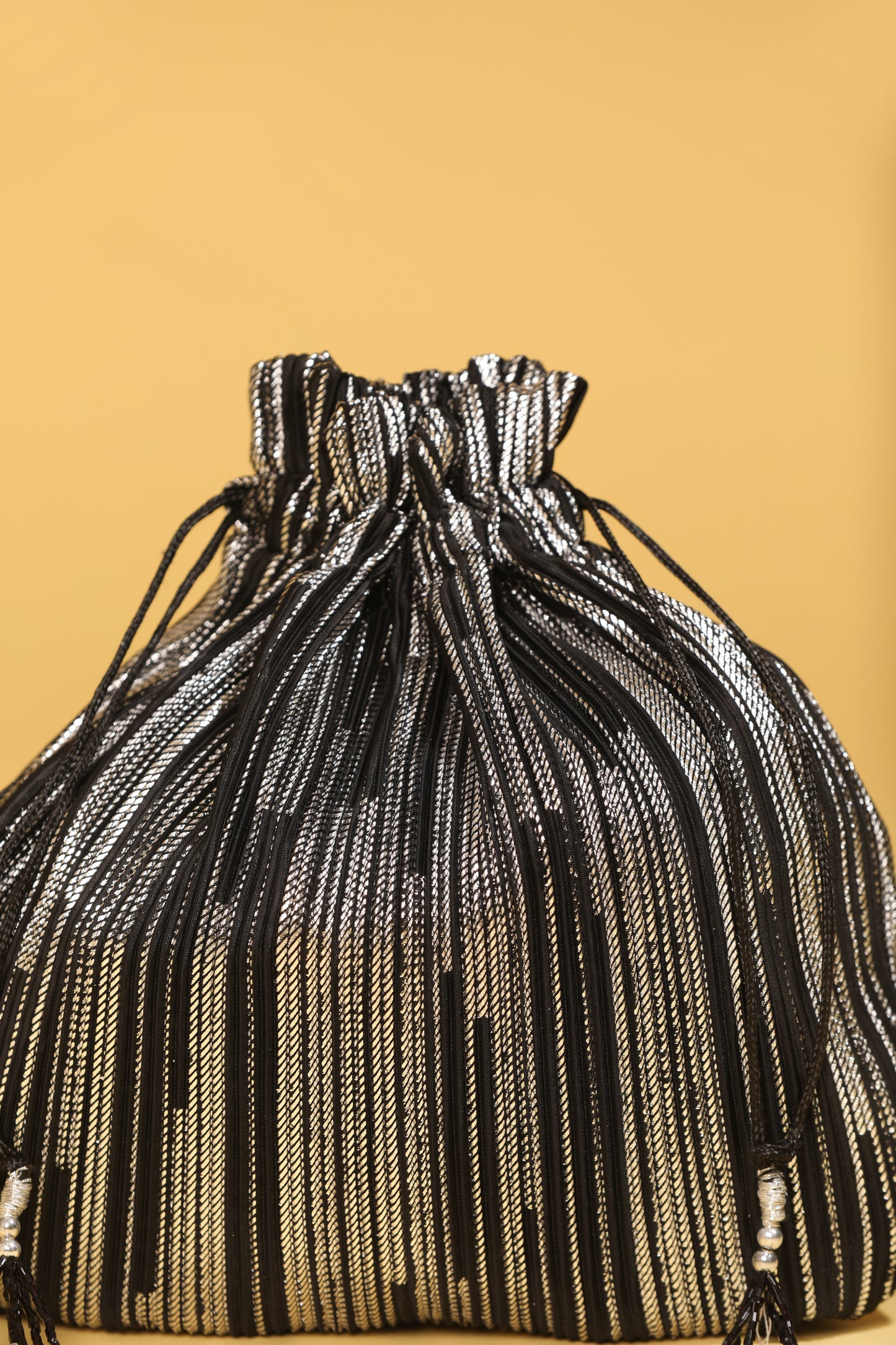 Black bead work potli bag, sequin potli bag, long tassel potli, black ethnic bag, glorious tower black potli bag
