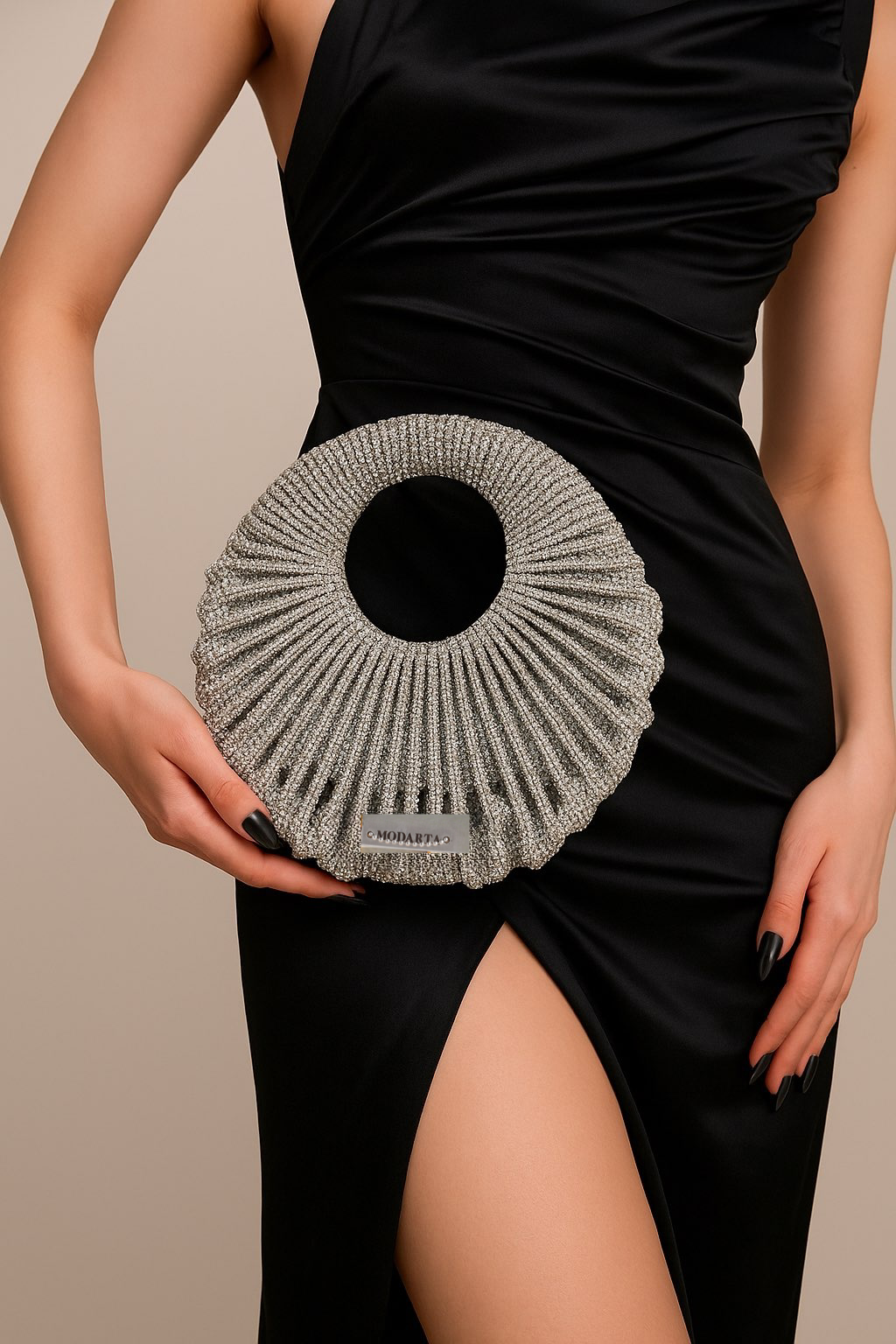 KRITIKA KHURANA THE BOHO GIRL CARRYING MODARTA SILVER CRESCENT CLUTCH