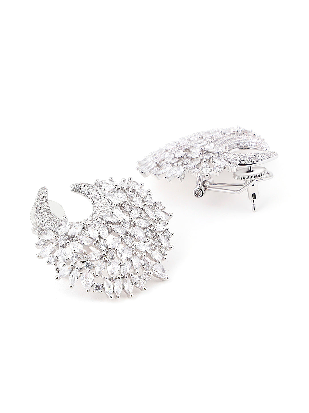 Close-up of floral crystal detailing on crescent earrings