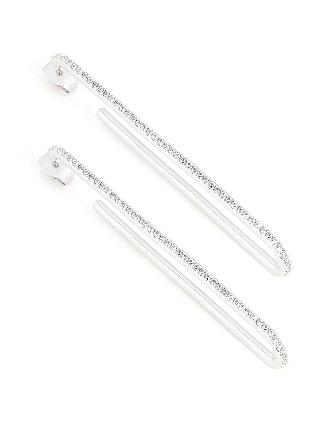 Lightweight loop silver earrings styled for daily wear