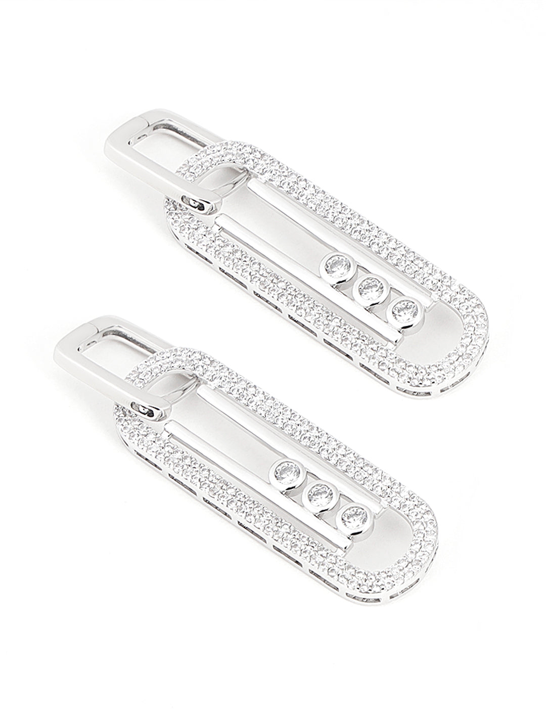 Close-up of sparkling crystals on loop earrings