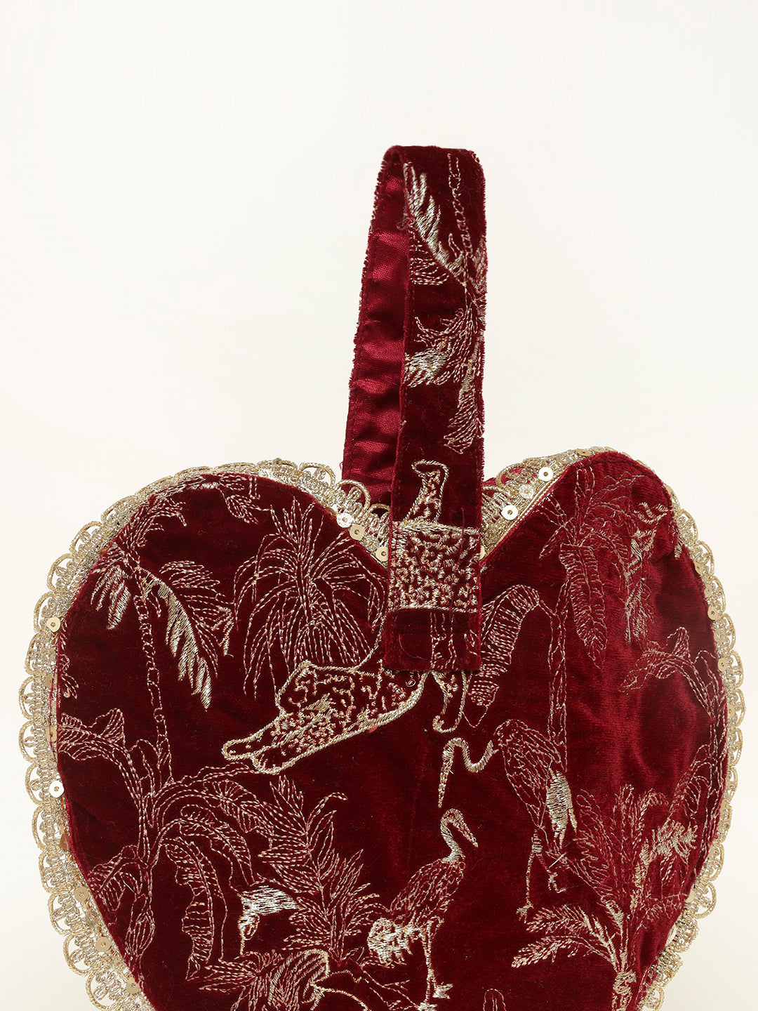 Festive velvet potli in red with bird design