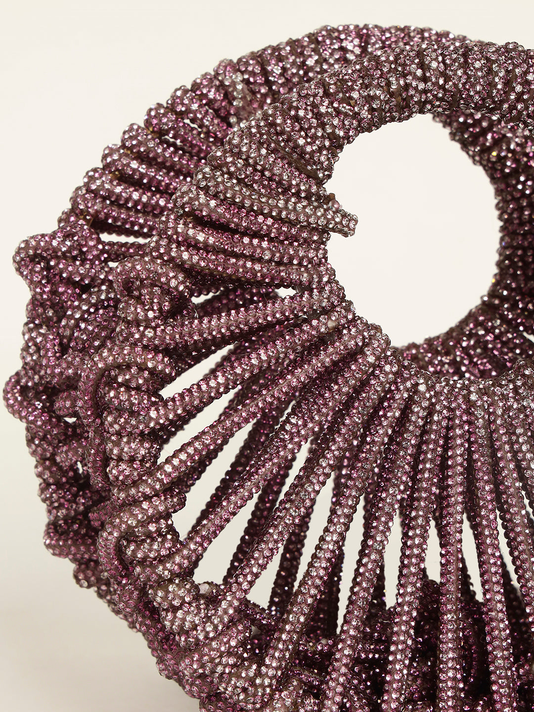 Close-up of stylish pink evening clutch purse