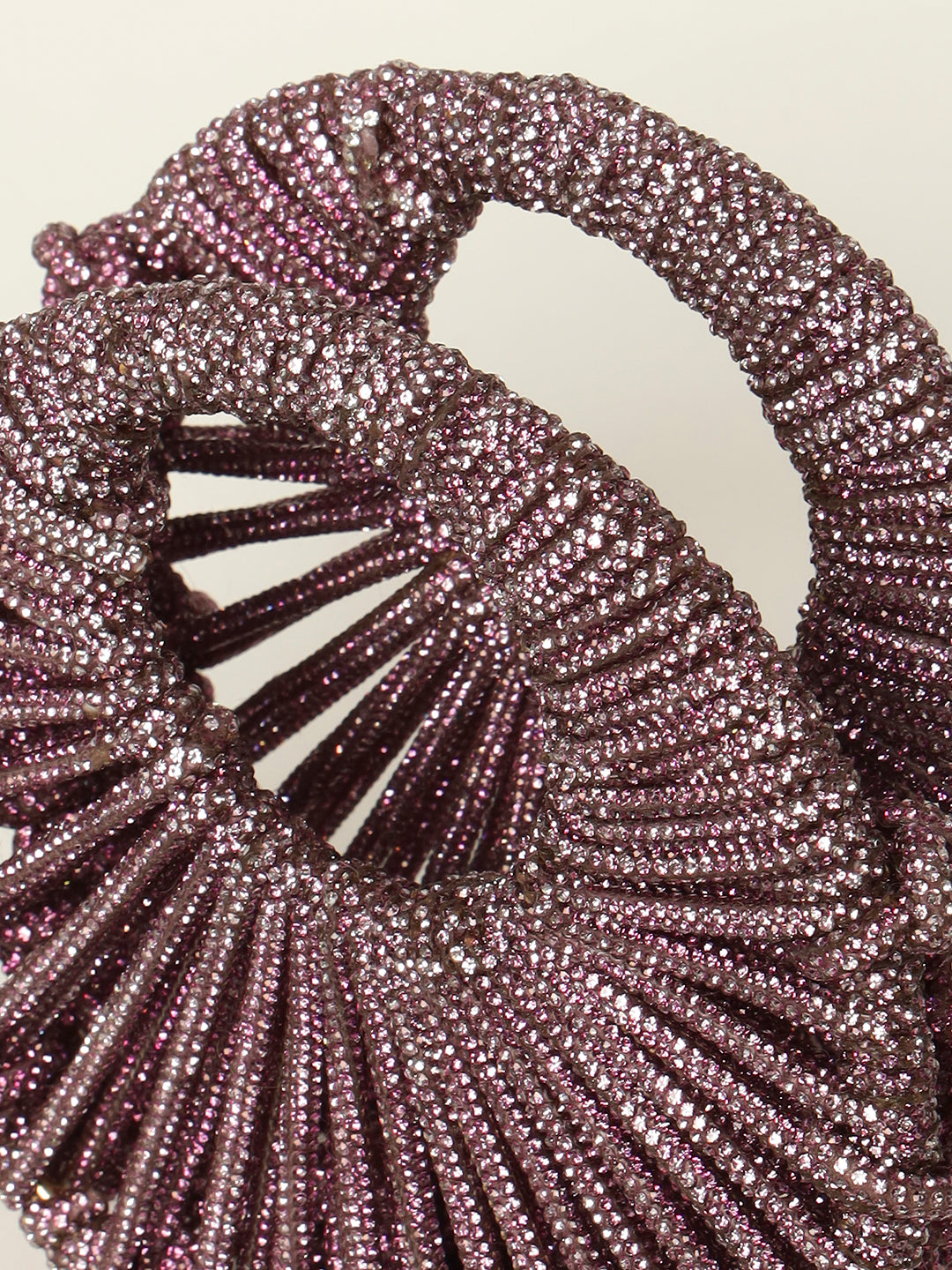 Soft pink handbag perfect for festive occasions