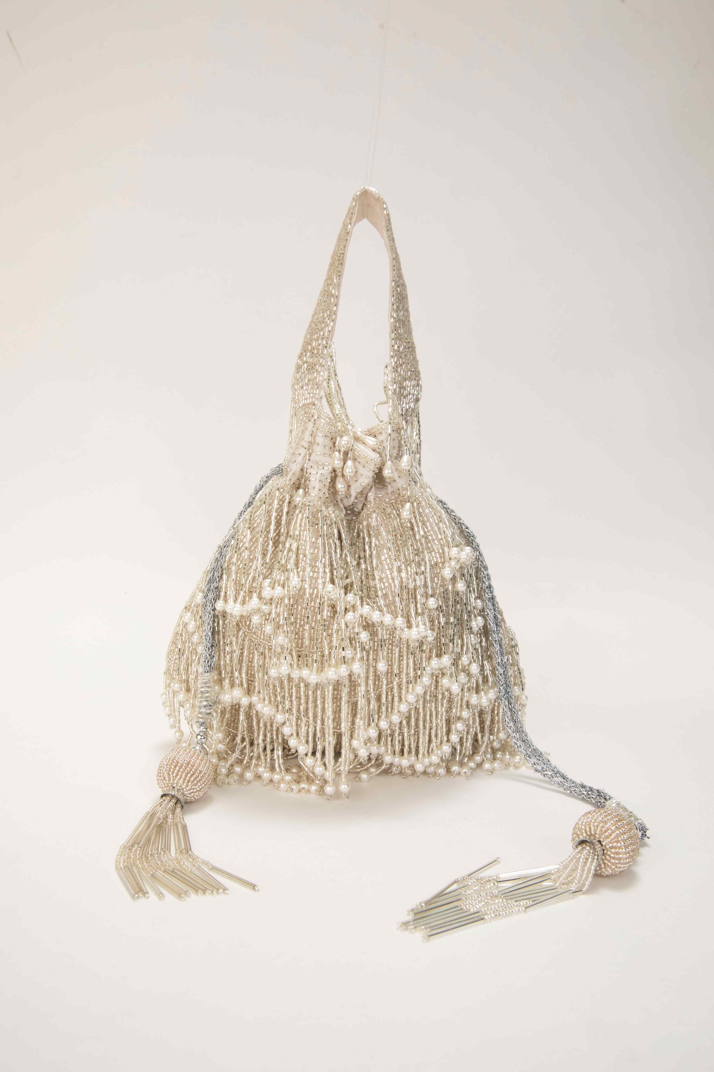 Women CDESIGNER POTLIS || Bridal potli || potli bag || Beige Pearl Tassel Potli