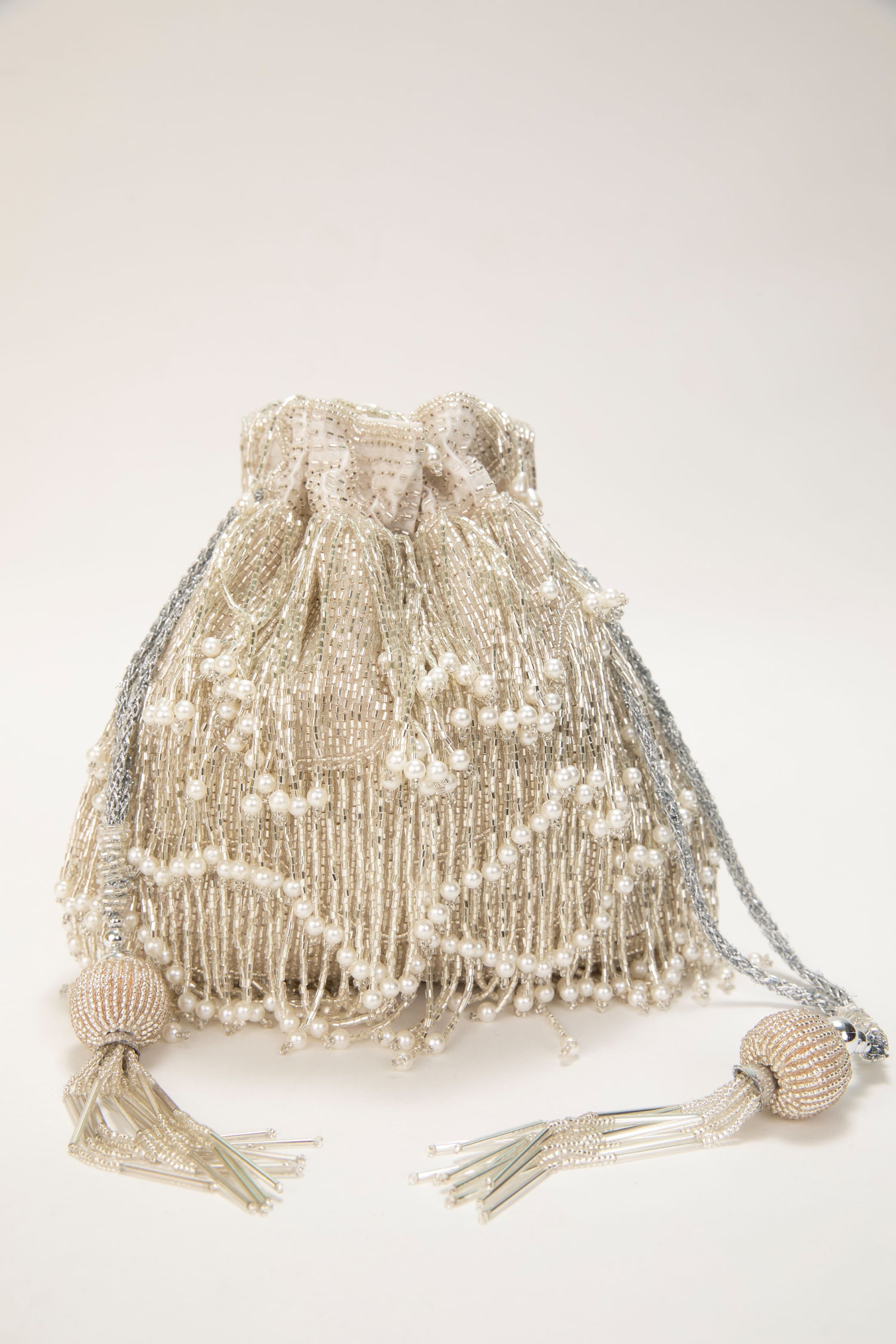 Women CDESIGNER POTLIS || Bridal potli || potli bag || Beige Pearl Tassel Potli