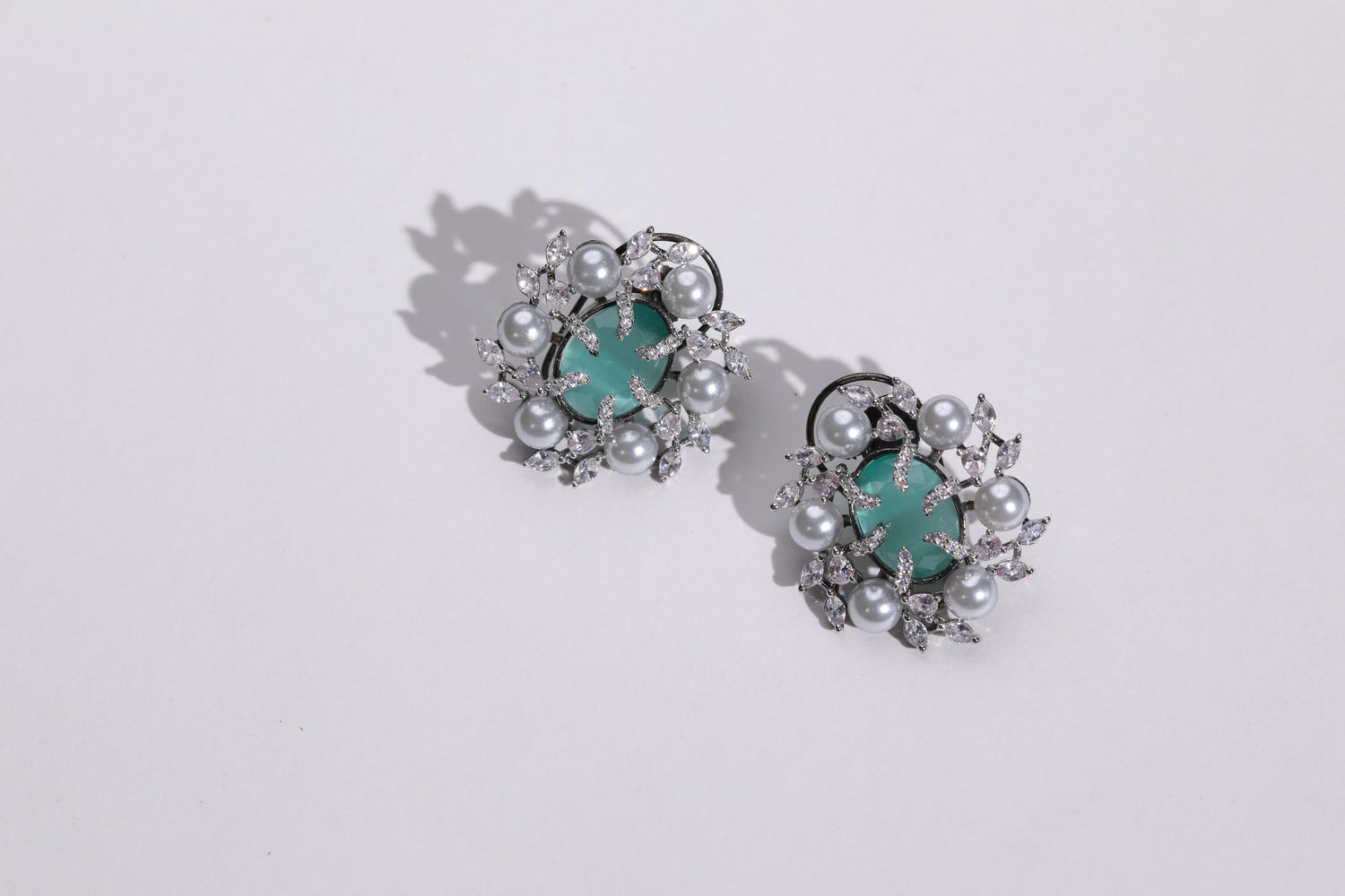 Timeless Emerald Accessories: Add a touch of sophistication to your outfit with these versatile earrings