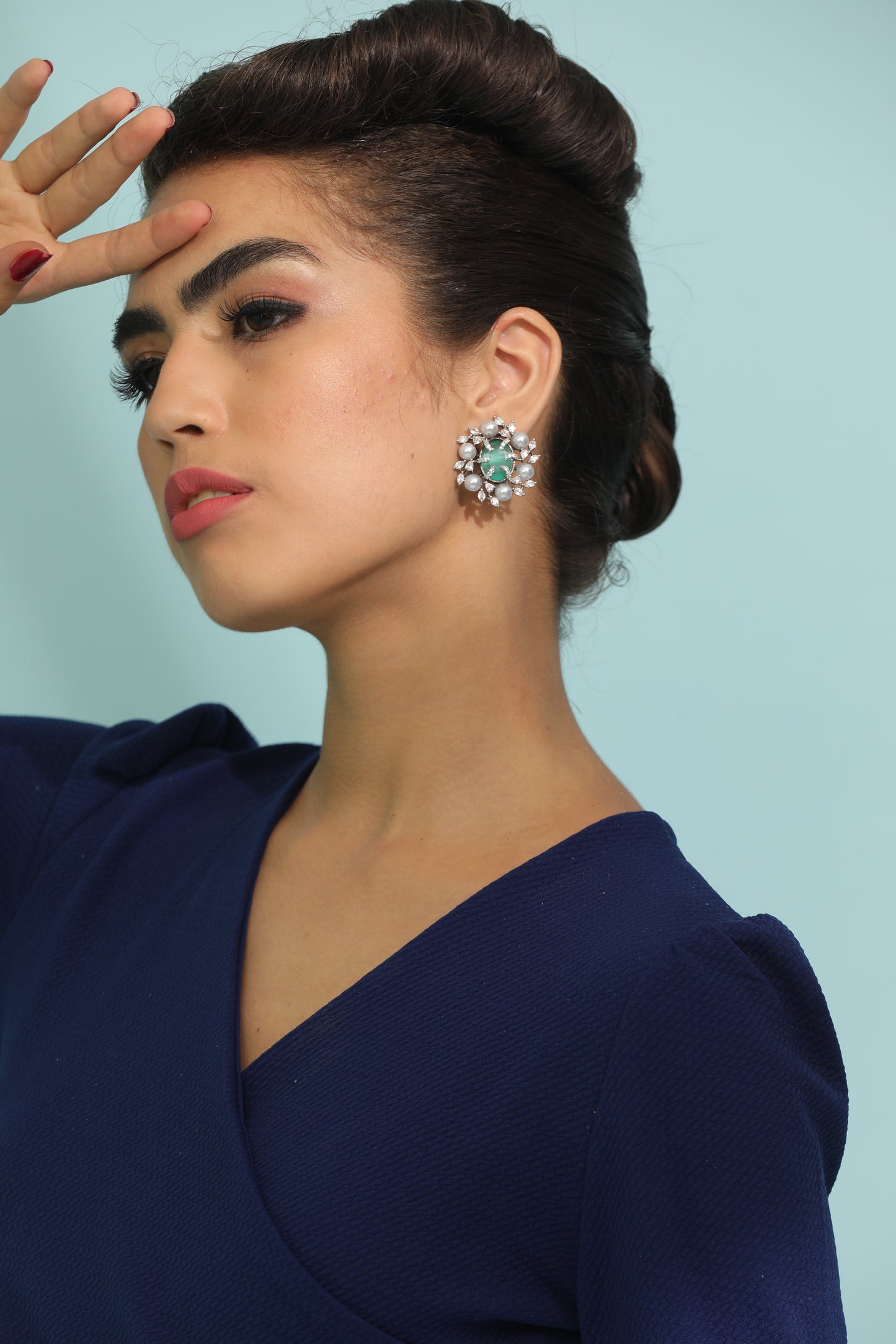 Understated Elegance: Make a statement with these classic emerald earrings, perfect for everyday wear.
