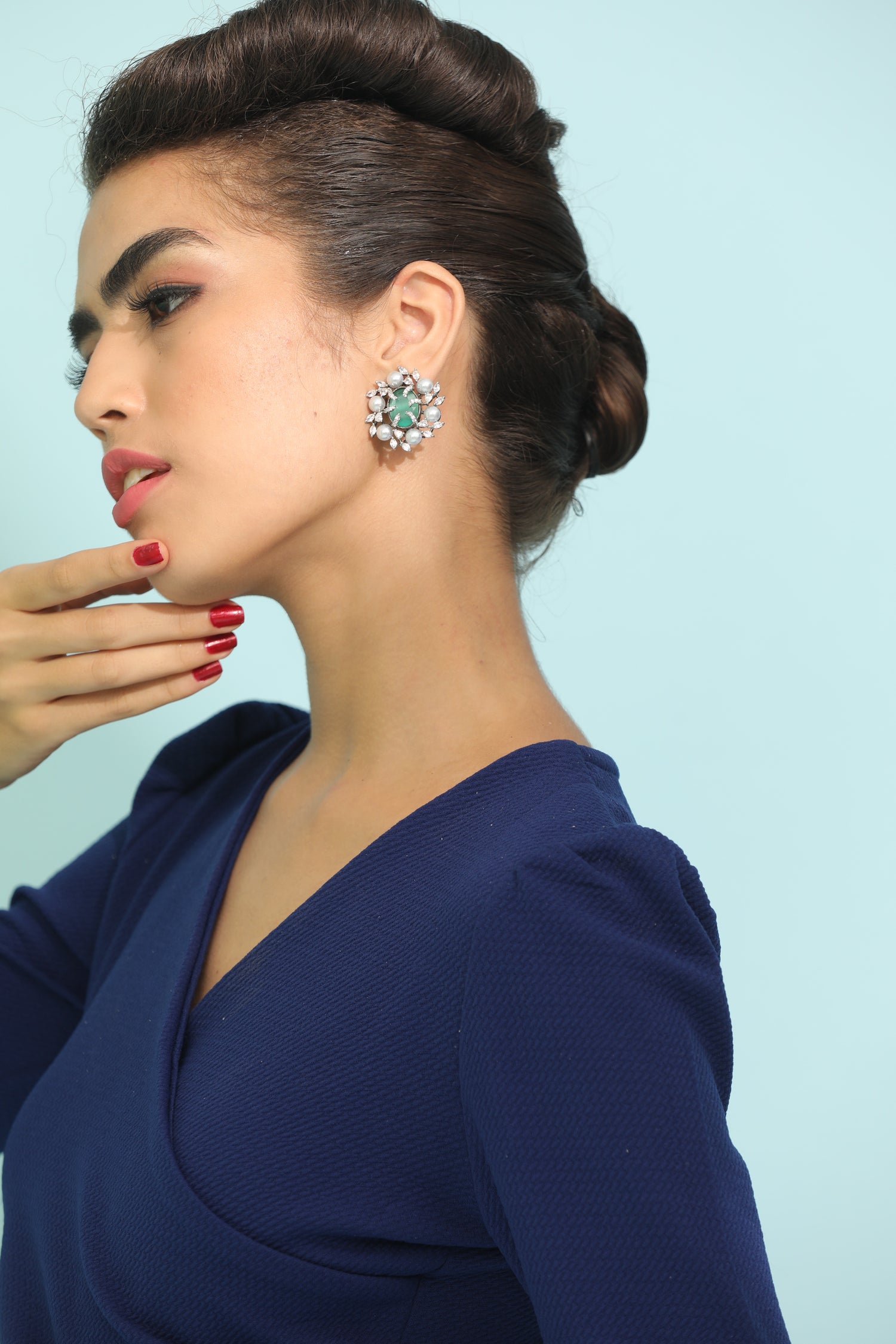 Everyday Elegance: Complete your look with these classic emerald earrings, suitable for all occasions." "Sophisticated Emerald Studs: Stand out with these minimalist emerald earrings, a must-have accessory