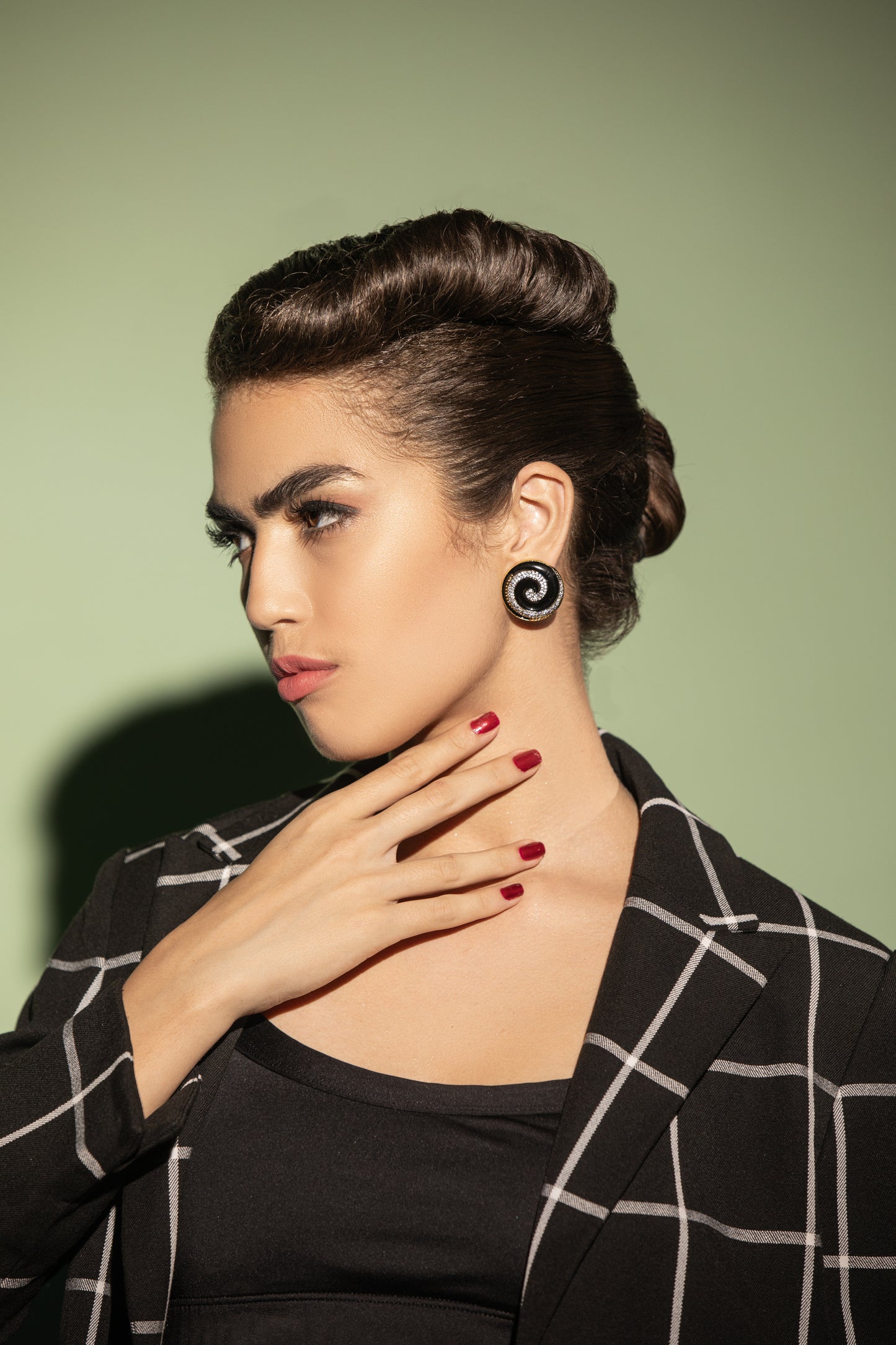 Bold and Impactful: Classic Black Spiral Circle Earrings: Elevate your look with these statement earrings