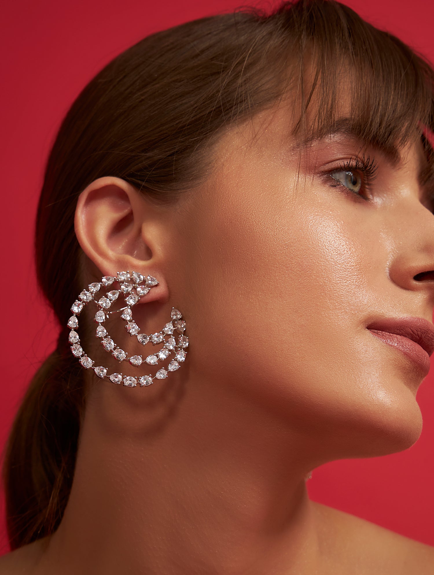 Elegant spiral crystal solitaire earrings for weddings parties
