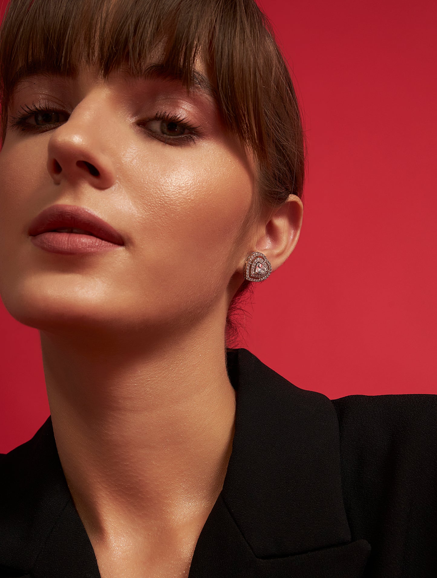 Premium heart earrings with spiral fashion accessory closeup