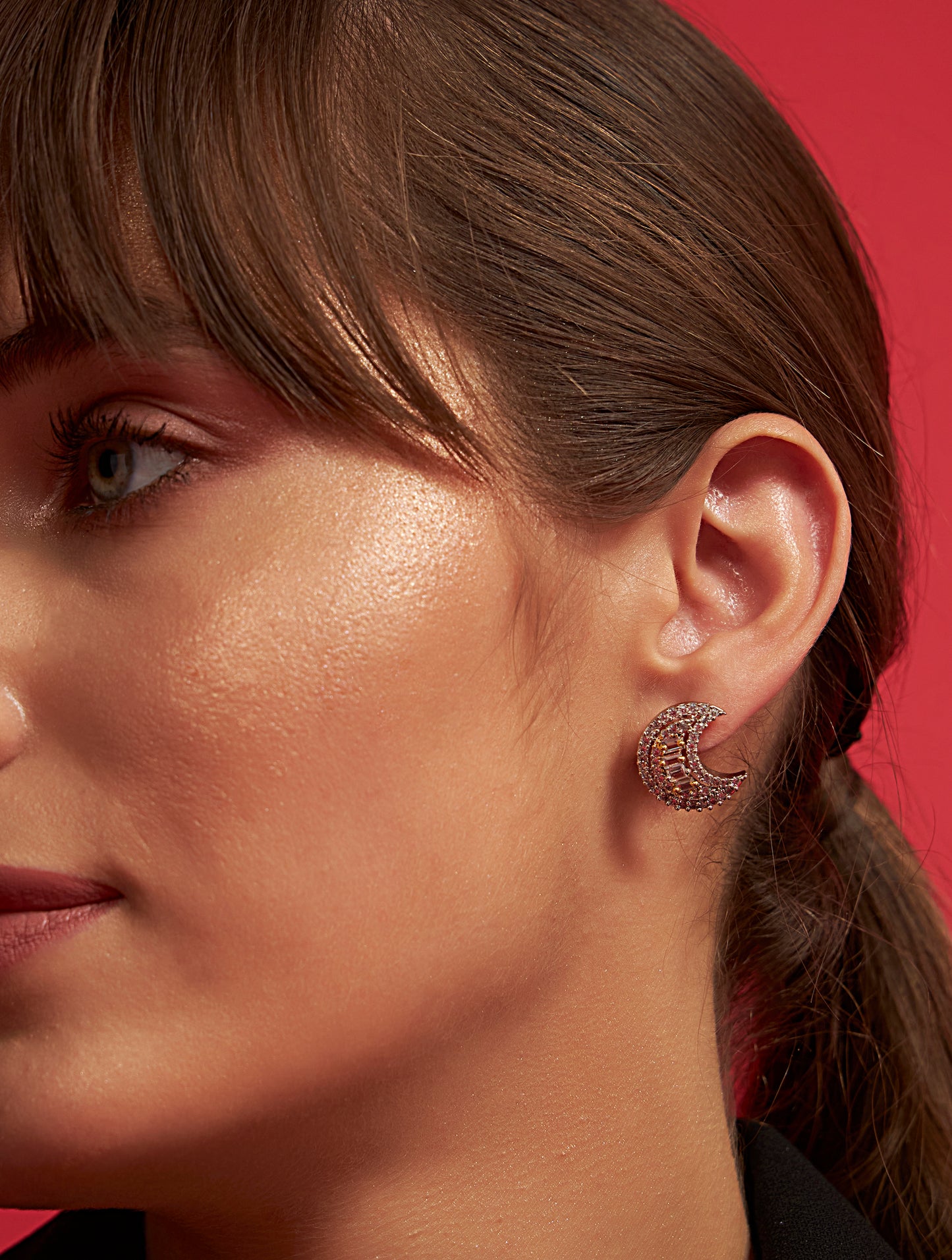 Designer crescent silver earrings with statement styling