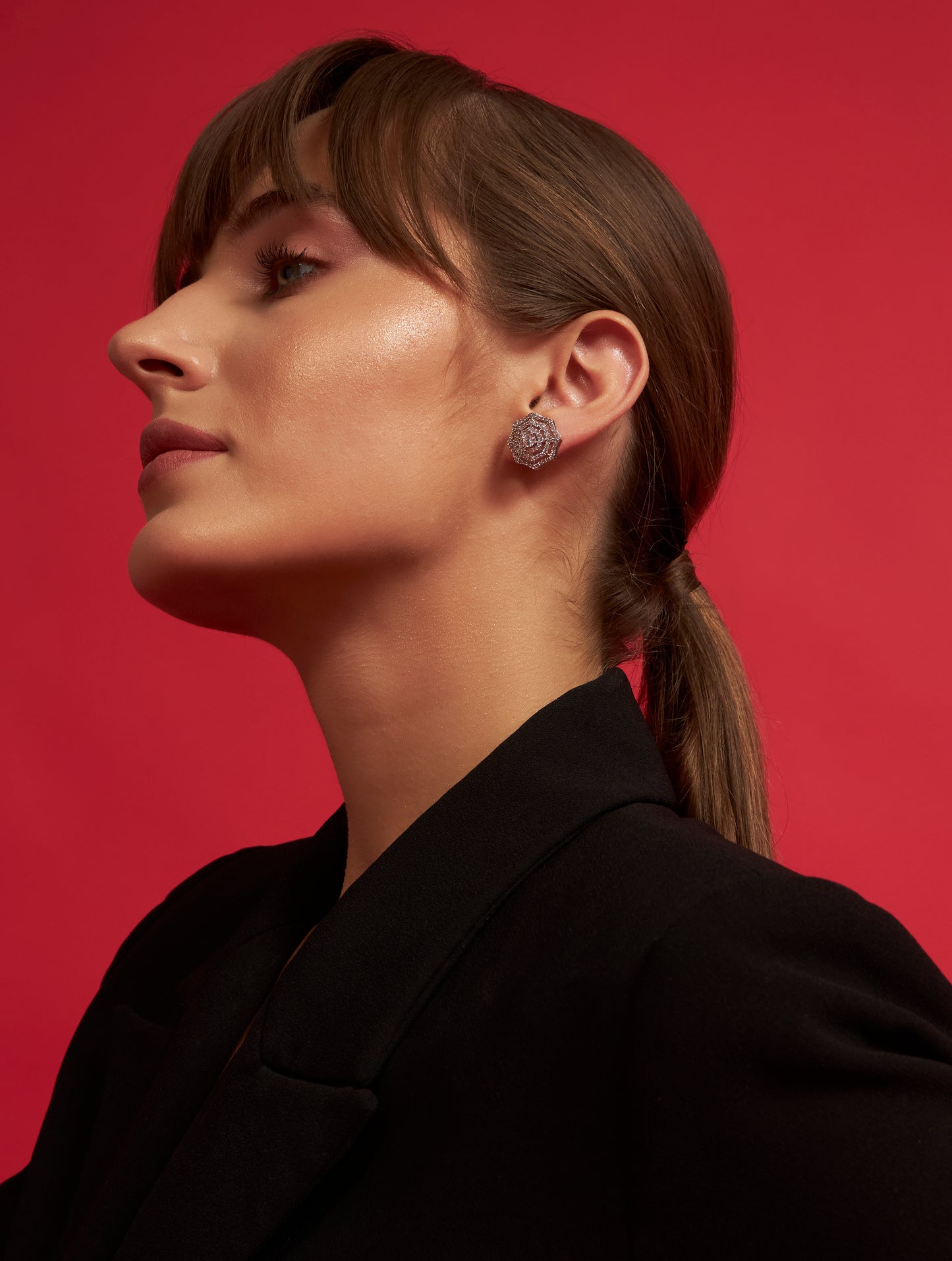 Designer web silver studs with statement styling