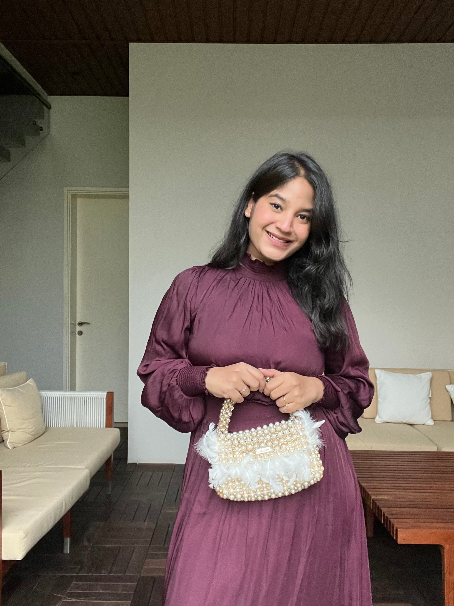 Nandini Khandelwal in Modarta Feather Bag