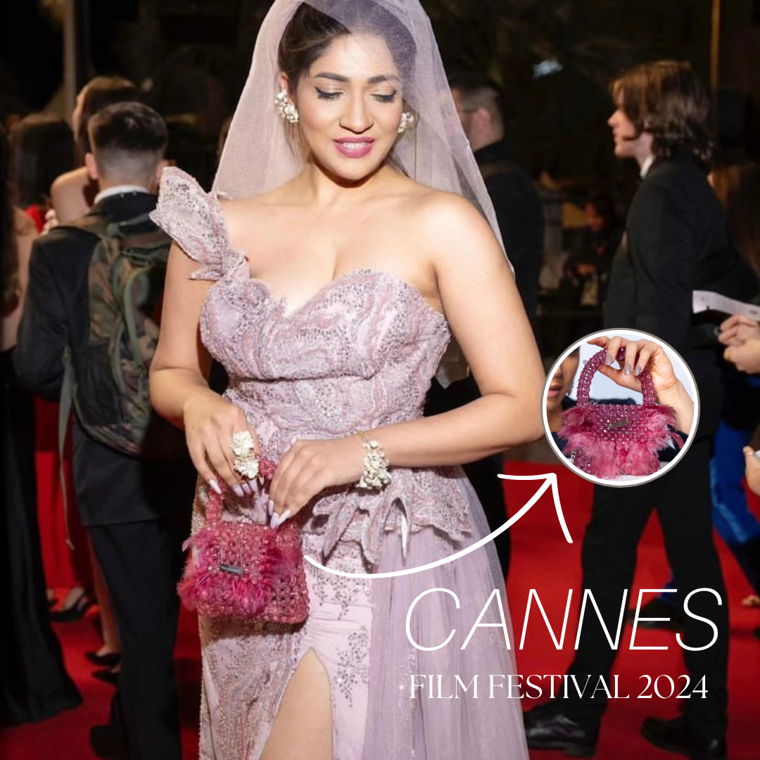 Iti Acharya carrying Modarta Pink Clutch at Cannes