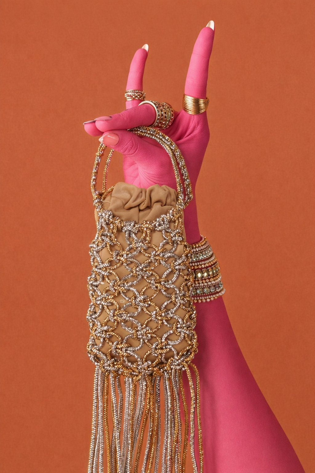 Silver gold crystal knot bag with long fringe detailing