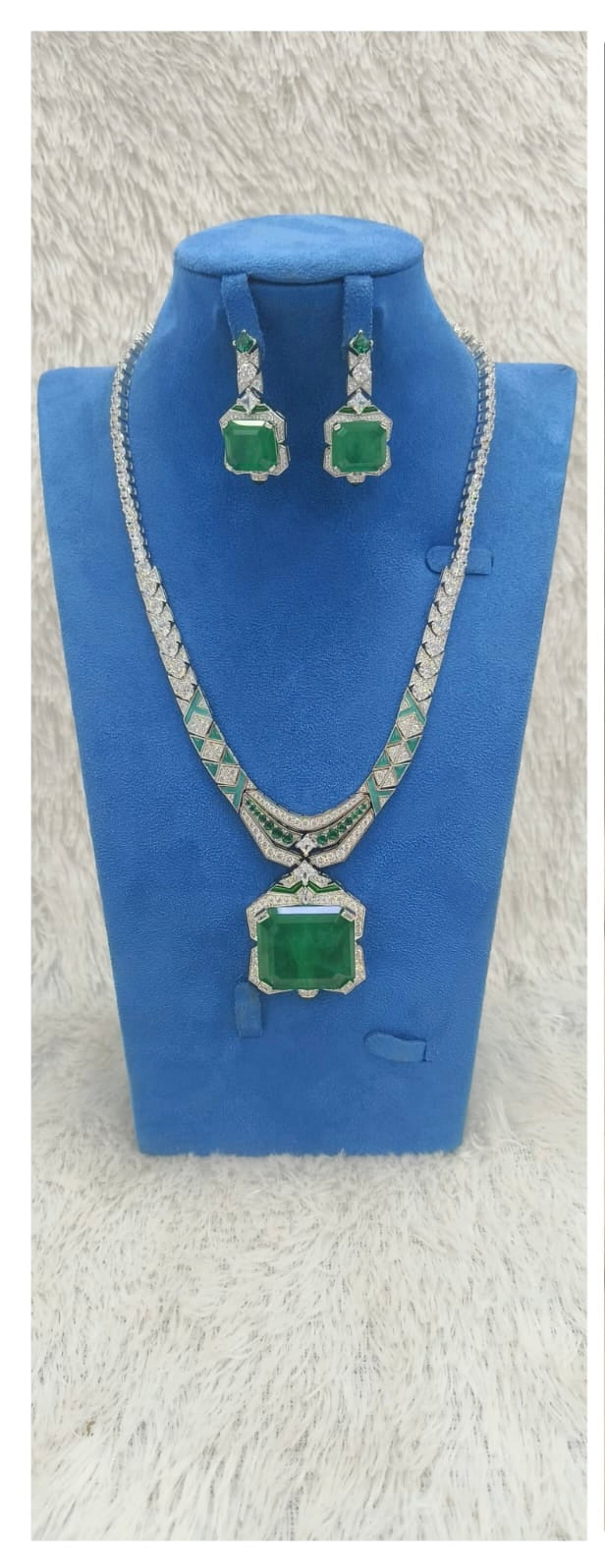 Statement emerald necklace set styled for party look